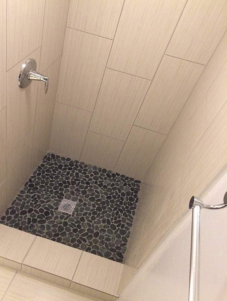 Sliced Charcoal Black Pebble Tile Shower Floor - Pebble Tile Shop