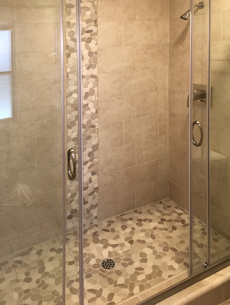 Sliced Tan & White Pebble Tile Shower Floor and Accent - Pebble Tile Shop